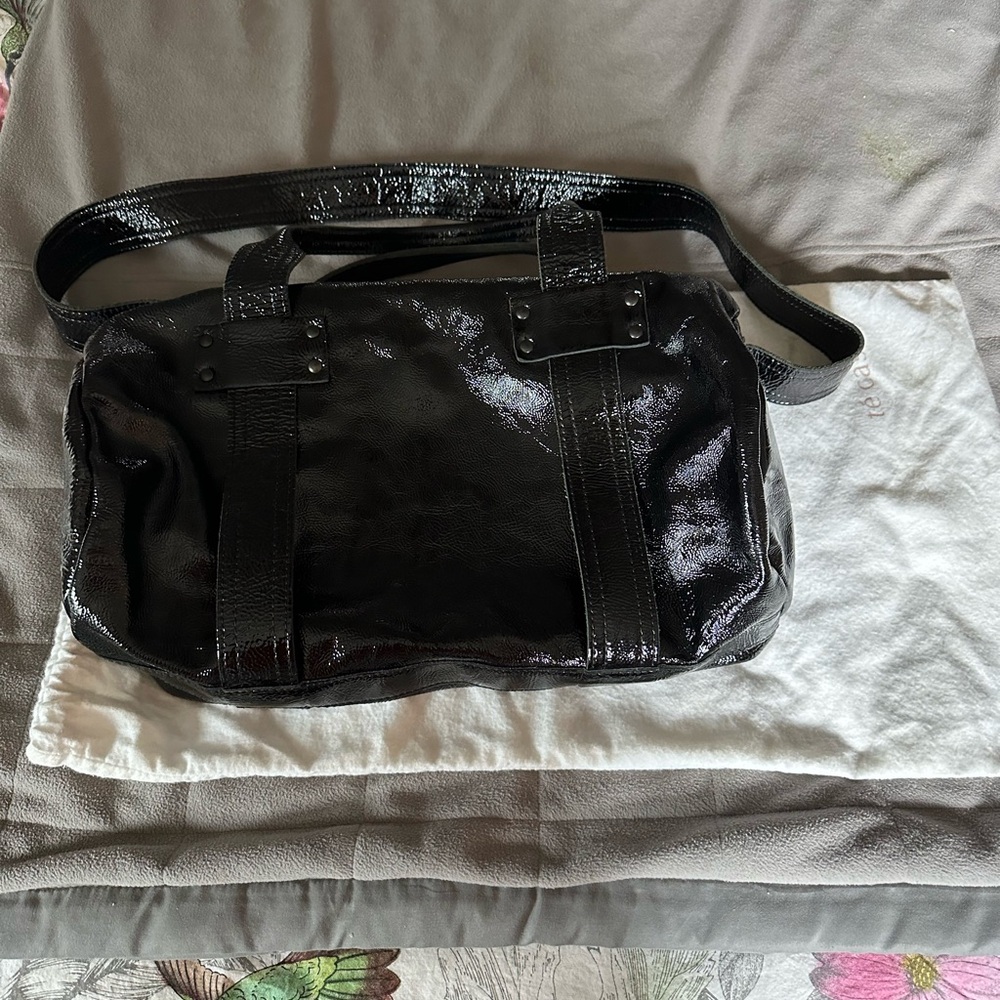 Got this the Casan bag in NYC used only few times black soft patent leather